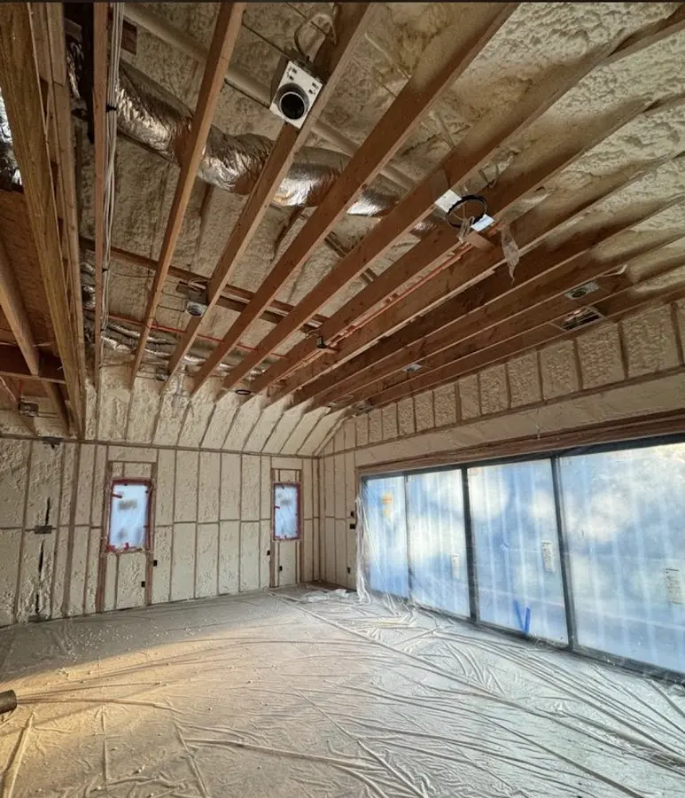 Interior walls and ceiling insulated with spray foam during new construction in Slaton
